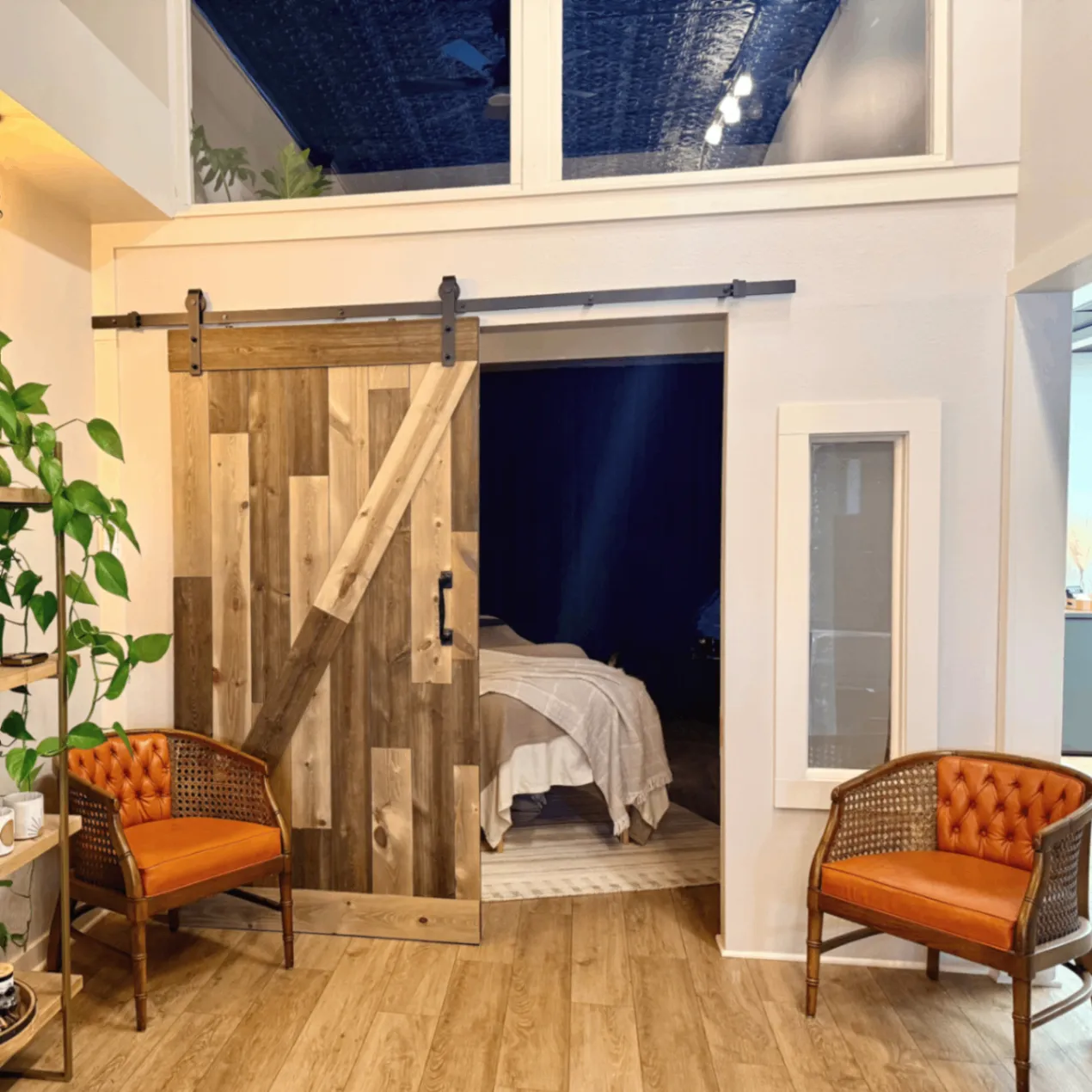 Orange studio chairs in the Pure Skin Esthetic treatment space
